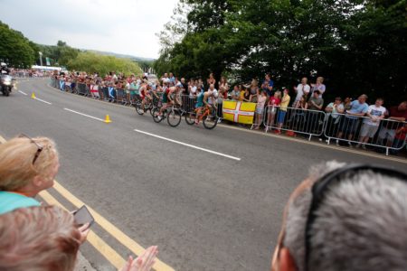 Pedestrian barriers providing crowd control along the route of the Commonwealth Games cycling event