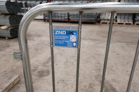 Branded QR Label using ZND UK branding on one of our SmartWeld Barriers. Inverted brand colours.