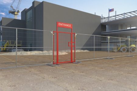 Pedestrian gate at a temporary fence installation on a construction site
